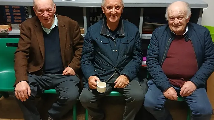 Dan O’Sullivan, Sean Hourihane and Jerry O’Sullivan enjoying a cup of tea at the Reenacreena National School’s 75th year anniversary celebrations.