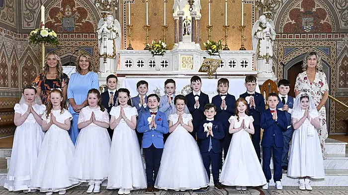 Pupils from Barryroe National School who received the sacrament of First Holy Communion in the Church of Our Lady, Star of the Sea Barryroe last Saturday.  Also included (from left): Katie McCarthy (SNA), Orla Whelton (principal) and Denise Foley (class teacher).   (Photo: Martin Walsh)