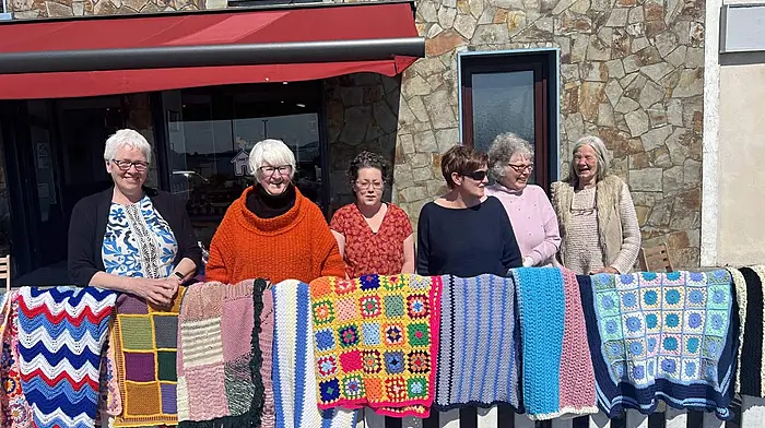 Schull Stitchers, Barbara Doyle, Carmel Waddy, Orla Finn, Mary McCarthy, Vanessa Tallon and Carol Sage Quinn displaying some of their work outside Casa T’s.