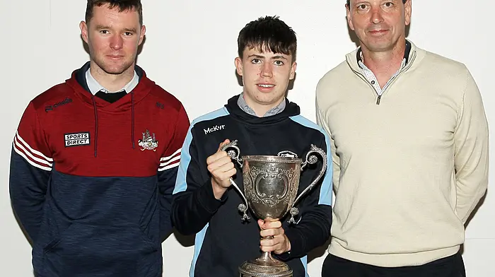 Carbery Rangers' Eric Hicks with Cork footballer Maurice Shanley and team manager Micheál O'Sullivan. (Photo: Paddy Feen)