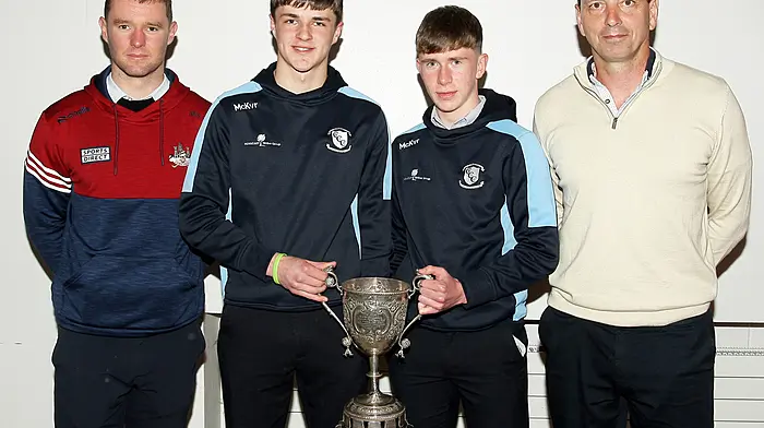 St James' Seán Whelton and Paddy Haughney with Cork footballer Maurice Shanley and team manager Micheál O'Sullivan. (Photo: Paddy Feen)
