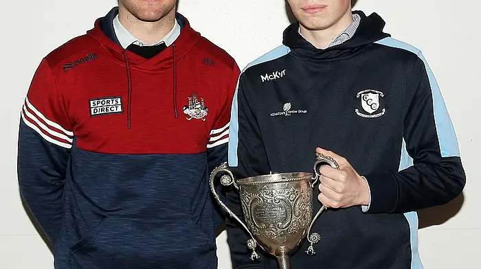 Castlehaven's James Maguire with Maurice Shanley. (Photo: Paddy Feen)