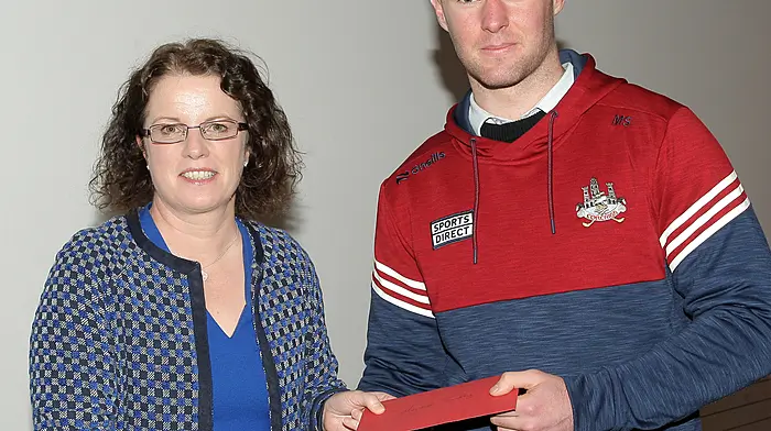 At the Simcox Cup medal presentation in Clonakilty Community College the Deputy Principal Anne Sheerin made a presentation to special guest Cork footballer Maurice Shanley. (Photo: Paddy Feen)