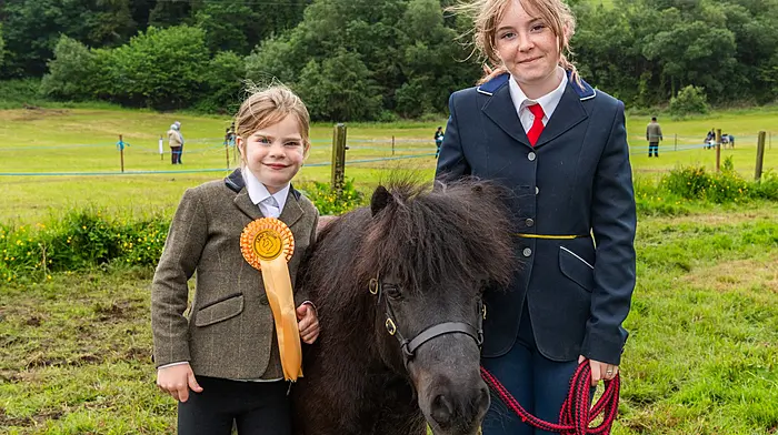 Leap, West Cork, Ireland. 1st Jun, 2026. Leap Horse and Pony Show took place today, despite the showery weather. Although the attendance was down on previous years, people still came out to make the show a success. Pictured with their pony 'Archie' are Rosa Nolan and Amellia Aston-O'Leary from Toe Head. Picture: Andy Gibson.