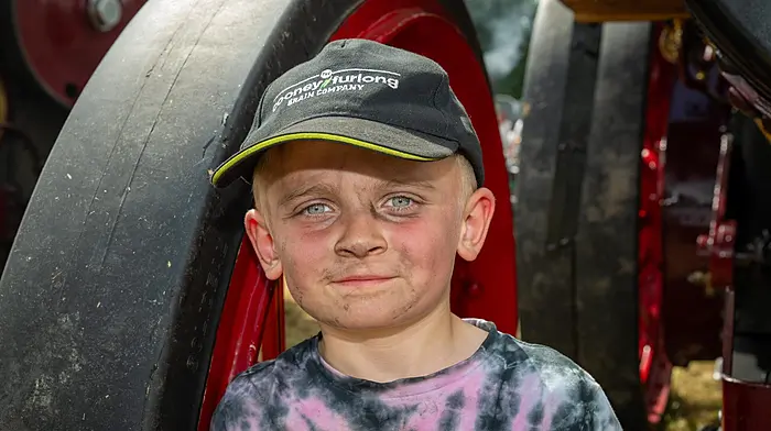 Conor Denby from Ferns helping out with a Garrett Steam Traction Engine at the Innishannon Steam Rally in Co. Cork over the June Bank Holiday weekend.Picture. John Allen