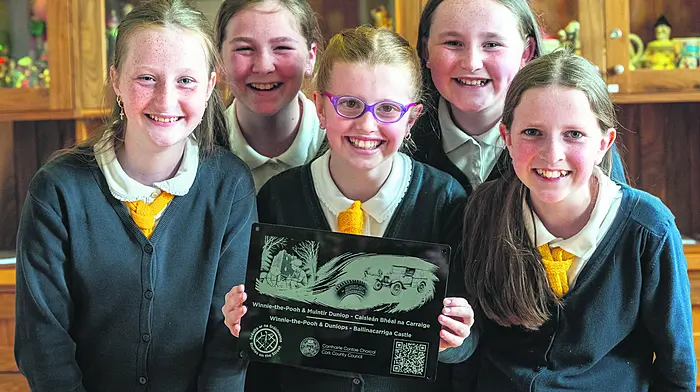 Roisin Owens, Charlotte Healy, Clara Farr, Aoife Bennett and Ellie McCarthy, 5th class pupils from St Marys Senior School Dunmanway showing a plaque with details about the Winnie the Pooh connection to the town at the launch of Stories on the Street, a community heritage project celebrating the people, places, and memories of Dunmanway.
Photo: John Allen