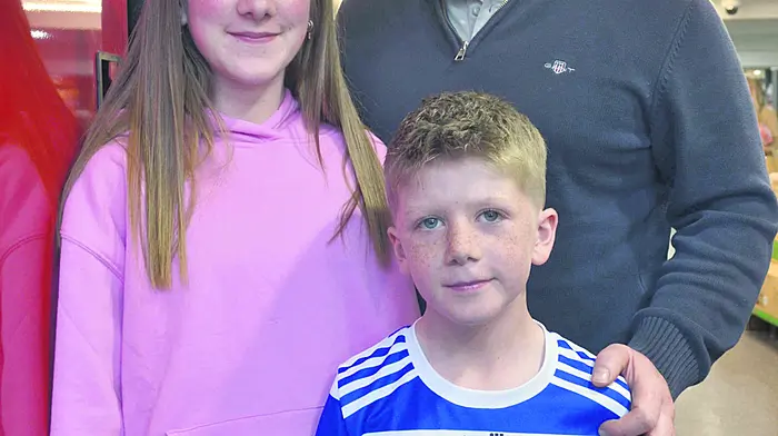 Kevin, Kate and Bertie Buckley shopping in Skibbereen last Saturday morning.  (Photo: Anne Minihane)