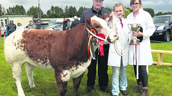 Judge Seamus Neary with Grace O’Donovan leading, and owner Denise O’Donovan (no relation) at the Bandon Agricultural Show.