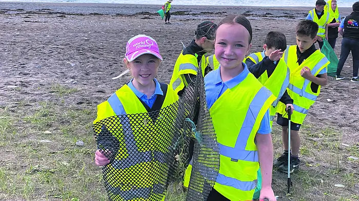 Emily Crowley and Farah McCarthy of Reenascreena National School with some of their collection at their beach clean-up in Ownahincha.