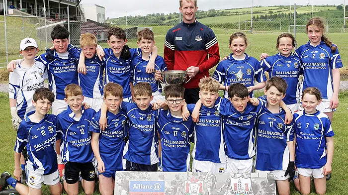 Cork footballer Ruairí Deane with Ballinagree NS, winners of Roinn 8 Mixed. (Photo: Paddy Feen)