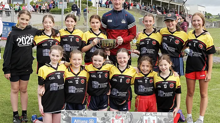 The Caheragh NS team that won the Roinn 6 final, with Cork ace Ruairí Deane. (Photo: Paddy Feen)