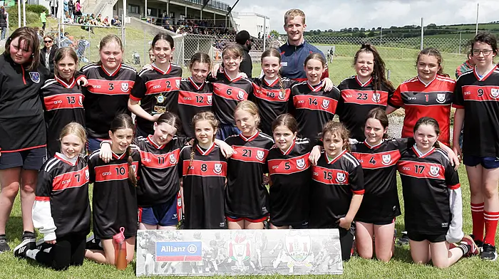 Scoil an Chroí Ro Naofa, Castletownbere, runners up in Roinn 2, with Cork footballer Ruairí Deane. (Photo: Paddy Feen)