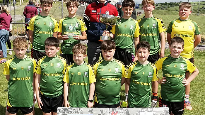 Coomhola NS, winners of Roinn 6 Boys, with Cork footballer David Buckley. (Photo: Paddy Feen)
