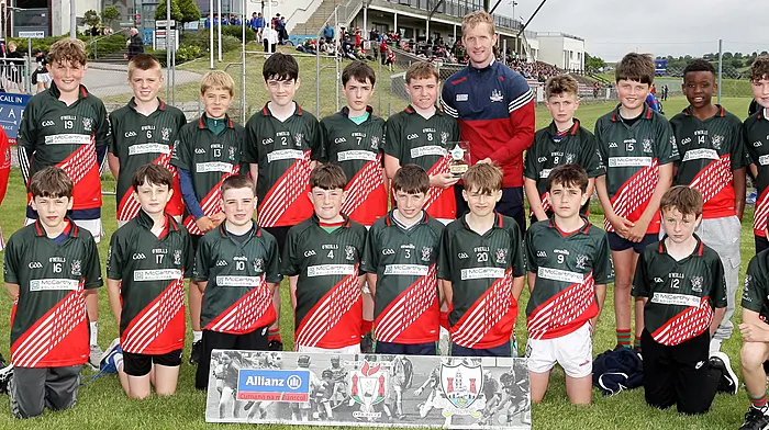 Scoil na mBuachaillí Clonakilty, runners up in Roinn 1, with Cork footballer Ruairí Deane.(Photo: Paddy Feen)