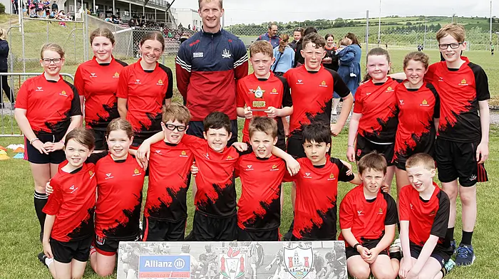 Kilcolman NS, runners up in Roinn 9, with Cork footballer Ruairí Deane. (Photo: Paddy Feen)