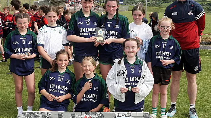 Lisheen NS, runners up in the Roinn 6 Girls final, with Cork star Ruairí Deane. (Photo: Paddy Feen)