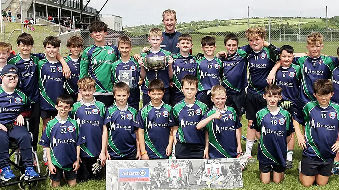 Rath NS, winners of Roinn 3 Boys, with Cork footballer Ruairí Deane. (Photo: Paddy Feen)