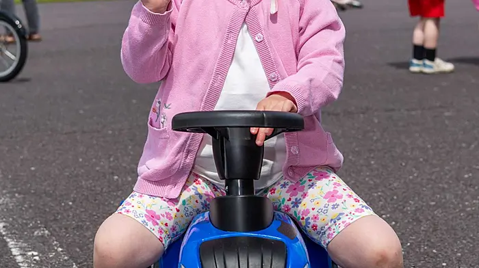 Randall Og GAA Club hosted a kid's tractor, bike & go-cart run today. A huge crowd of kids attended on various modes of transport under sunshine and warm weather. Two year old Ayda O'Brien from Ballinacarriga at the run. Picture: Andy Gibson.