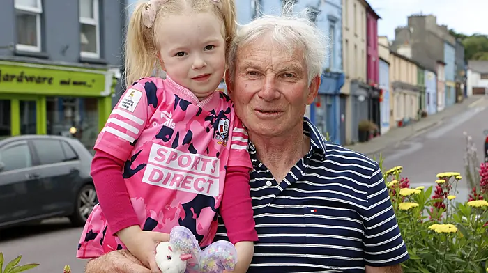 Michael O'Callaghan and his granddaughter, Callie Hayes (5), enjoying a sunny Father's Day afternoon in schull. Photo by Carlos Benlayo