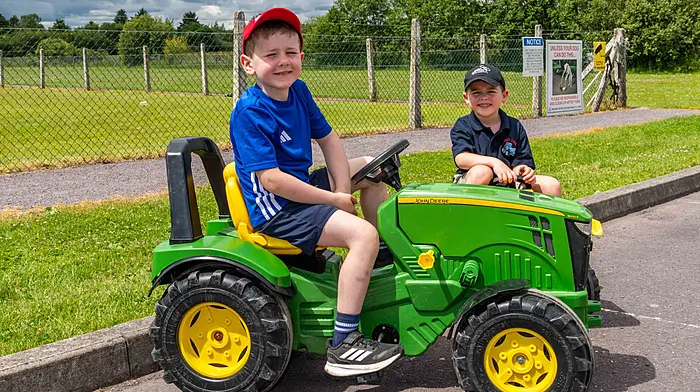 Randall Og GAA Club hosted a kid's tractor, bike & go-cart run today. A huge crowd of kids attended on various modes of transport under sunshine and warm weather. Cousins Denis Ryan, Kilbrittain and Elliott Forde from Dunmanway at the run. Picture: Andy Gibson.