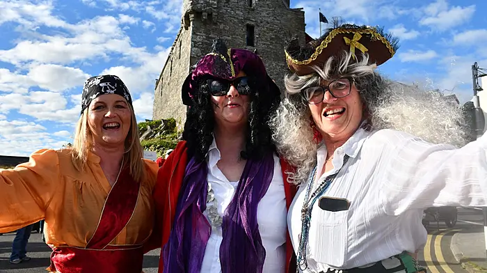 Monica Jones, Margaret Harrington and Kathleen Leonard local pirates come searching for treasure during the opening parade at the Baltimore Pirate Festival last weekend. Photo; Anne Minihane.