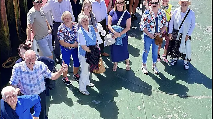 Members of the Beara Shimmy Shaker dance group heading home from an afternoon's dance event on Bere Island.