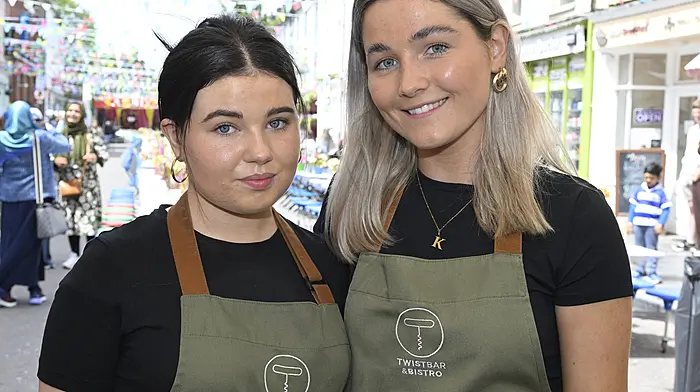 Locals Julie Casey (left) and Kellie O'Gorman from the Clonakilty Park Hotel helping out at the Clonakilty Street Carnival.   (Photo: Martin Walsh)