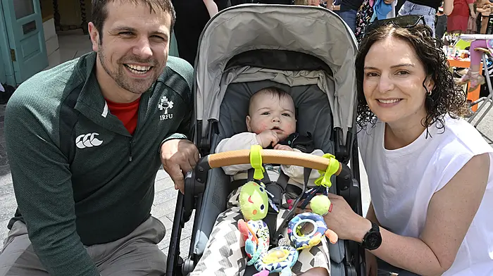 Enjoying the Clonakilty Street Carnival were locals (from left) Cal and Ben McCarthy, and Jill Turner.  (Photo: Martin Walsh)
