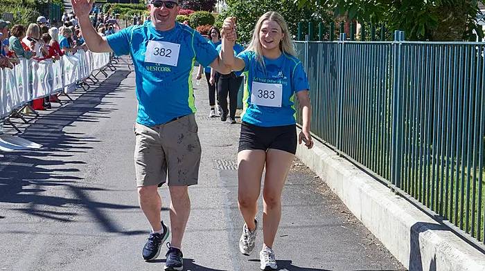 Father and daughter duo Kevin and Hazel Murphy crossing the finish line together at the Dunmanway 10k on Father’s Day.
