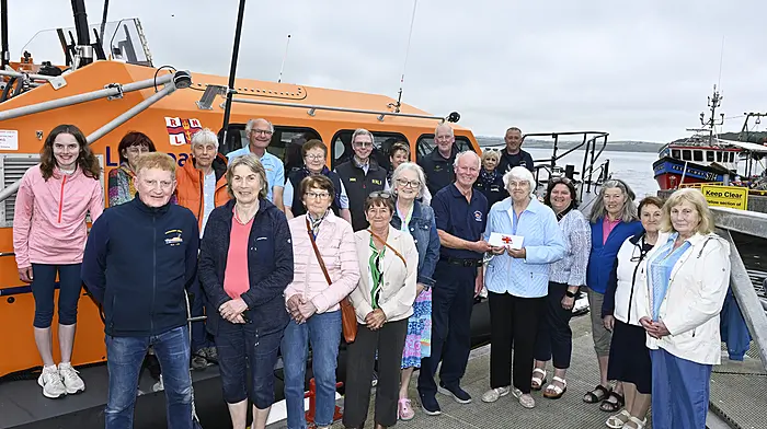 Patsy Northridge, a great fundraiser of the Courtmacsherry RNLI, presented the proceeds of an open evening in aid of the RNLI Lifeboats that was her held at her home in Kilbrittain to David Dunwoody of the Courtmacsherry RNLI fundraising committee when she and her friends visited the station in Courtmacsherry last week.  At the pontoon alongside the Courtmacsherry RNLB Val Adnams are (front): Vincent O'Donovan, Sylvia Tanner, Margaret McCarthy, Josie Fleming, Mary Anne Horgan, Liz O'Connor, Grainne Barrett, Mary Whelton and Marion Molloy.  Back: Lisa O'Connor, Louise Kerschbann, Celia Sheehy, Brian O'Dwyer, Martha Drake, Ian Anderson, Ann O'Donovan, Liam Murphy, Joan O'Donovan and Tadgh McCarthy.   (Photo: Martin Walsh)
