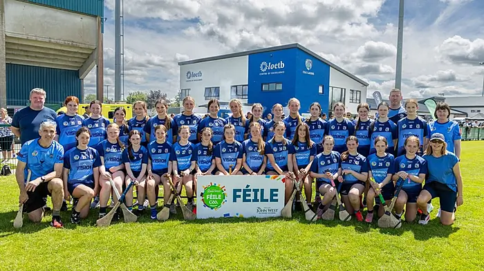 The Barryroe U15 camogie team and mentors Paul O'Regan, Padraig Collins, Mary Harrington, Liam Harte and Teresa Tobin at the John West Féile na nGael competition in Portlaoise last Saturday.