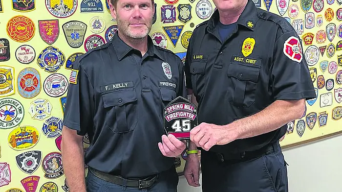 Fergal Kelly (right) formerly of Kilronan, Dunmanway, recently graduated as a volunteer firefighter in Philadelphia after a year of intensive training.