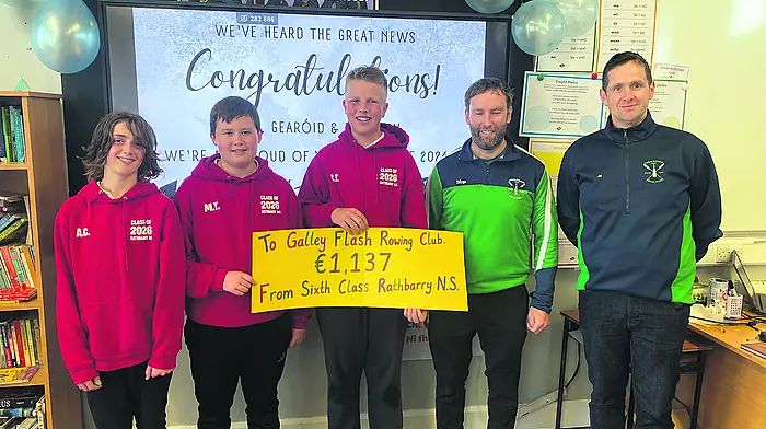 Rathbarry National School’s sixth class pupils proudly presenting €1,137 to Danny Hayes and John Harrington of Galleyflash Rowing Club following their recent triathlon fundraiser.