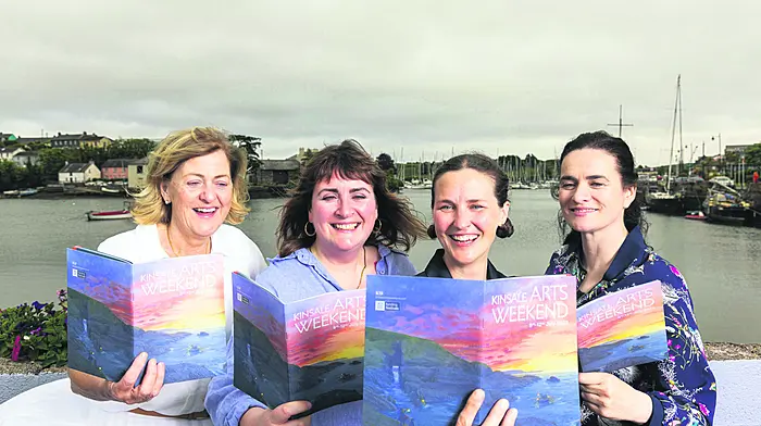 Anna Mulcahy (chairperson, Kinsale Arts Weekend), Lisa O'Brien (festival curator, Kinsale Arts Weekend), Erin Connally (artist who painted the programme cover art), and Irene Buckley (composer) at the launch of the Kinsale Arts Weekend 2026 programme at the Temperance Hall in Kinsale.  (Photo: Michael O'Sullivan)