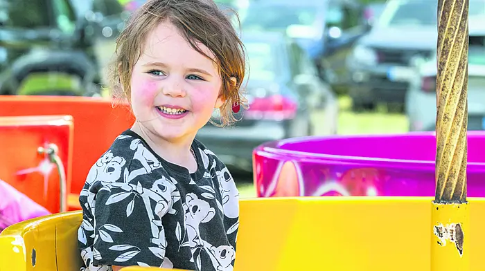 Dunmanway, West Cork, Ireland. 5th Jul, 2026. Dunmanway Agricultural Show took place today in sunny weather with thousands of people attending. Enjoying a ride on the teacups was Lucy Swanton from Durrus. Picture: Andy Gibson.