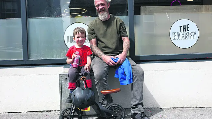 Ronan Quinlan pictured with his son, Donnacha, during a day out in Schull. Photo by Carlos Benlayo