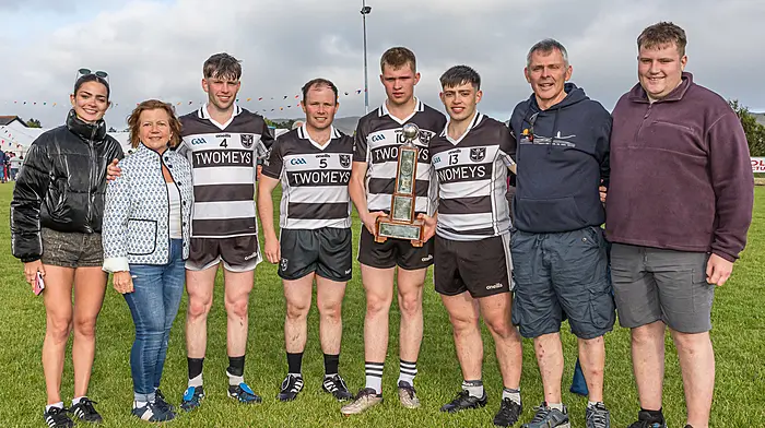 The Murphy Family from Bere Island with the Donie Harrington Trophy. (From the left) Michelagh, Edel, Billy, Oisin, Ultan Olan Brendan, and Brendán Murphy. Picture: Anne Marie Cronin Photography
