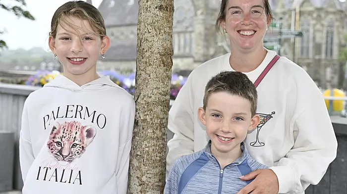 Mags O'Leary, Tirnanean, Barryroe and her children Erin and Cathal out and about in Clonakilty. Photo: Martin Walsh.