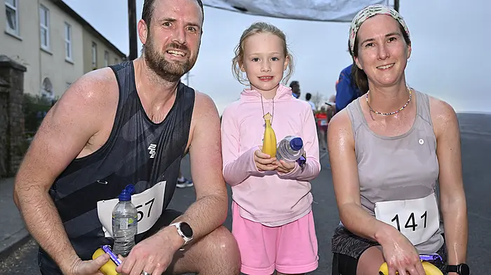 Local runners Timmy Carroll and Debra O'Leary pictured after they finished the Courtmacsherry 10km Road Race last Friday evening. Debra, won the Ladies 35-39 category. Also included is Eliza Carroll. (Photo: Martin Walsh).