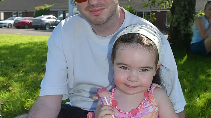 Maisie and Killian Long, Rosscarbery waiting for the runners to finish the Run Skibb 10k and half marathon last Sunday afternoon. Photo; Anne Minihane.