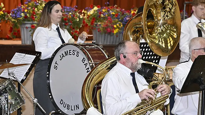 Sousaphonist Noel Carroll and drummer Virginia Cubilios from the St. James's Brass and Reed Band, Dublin performing at the South of Ireland Band Championships in Clonakilty. Photo: Martin Walsh.