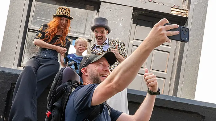 REPRO FREE
Stiltwalkers Lidija Sola and Cormac Mohally from Pitch’d with 2 yr old Rohan Veldsman and his father Brian from Aberdeen during Kinsale Arts Weekend.
Picture. John Allen

Sun, Sea and Storytelling: Kinsale Arts Weekend Celebrates 10th Anniversary This Weekend with Over 50 Spectacular Events

KINSALE, IRELAND – July 2026. With the weather forecast promising a spectacular, sunny weekend ahead, there is no better time to experience world-class culture in one of Ireland’s most beautiful seaside towns. This weekend, from 9th to 12th July 2026, the historic coastal town of Kinsale will transform into a stage for the milestone 10th anniversary of the Kinsale Arts Weekend.

This year’s festival features a packed schedule of over 50 events spanning music, theatre, film, visual art, literature and dance. Over four days, visitors and locals alike are invited to dive into an immersive cultural journey across intimate and unconventional venues throughout the town.

Festival Highlights
GHOSTIS: Celebrating the Origins of Welcome

GHOSTIS: Celebrating the Origins of Welcome, a joyful and thought-provoking live panel discussion curated by artist and writer Jennie Moran, taking place at the Methodist Church in Kinsale on Friday, 10th July at 6pm. This unique event explores the deep customs, rituals and philosophies of hospitality across global cultures through personal stories, food and community. This year’s inspiring contributors include Ali Hamou, a human rights advocate and founder of One Community Cork; Cecilia Gámez Campanella, a founding member of the Mexican Community in Cork who builds cultural bridges through music and art; and Virginia O'Gara, the co-founder of My Goodness and the Cork Urban Soil Project who explores sustainability and the circular economy as acts of care. Together, these speakers will share moving perspectives on how we welcome strangers, share traditions and create a collective sense of home.

An Operatic Masterpiece: The Lament for Art O'Leary

Another extraordinary highlight of the weekend is The Lament for Art O'Leary, taking place on Saturday, 11th July in a powerful collaboration with the Joseph Walsh Studio. This event offers a haunting, contemporary operatic reimagining of one of Ireland's most profound expressions of grief, love and defiance. Featuring an evocative score by composer Irene Buckley and text by poet Vona Groarke, the experience begins with an open-air introduction to the tradition of keening by Professor Tríona Ní Shíocháin, before moving indoors for an atmospheric concert featuring powerhouse sopranos Emma Nash and Kim Sheehan.

Adding to the festival's vibrant celebration of powerful female voices, audiences can also look forward to Rí Rá Mná: Live Podcast and the compelling short film screening Trína Súile. Taking place on Friday, 10th July at 12:30pm at The Post House Café, Rí Rá Mná brings a live recording of the popular UCC Radio podcast to Kinsale. Hosted by Sinéad Moynihan and Susan Brown, the session features a unique gathering of conversation, song and connection with special guest Gilly McArthur - an acclaimed cold-water swim coach, free climber and author - alongside rich harmonic performances by Kinsale’s all-female Sound Waves Choir. Complementing this on Sunday, 12th July at 1:00 PM at the Carmelite Friary, filmmaker Darina Clancy presents Trína Súile, a powerful Irish-language short film project exploring the overlooked legacies and remarkable resilience of historic Irish women. Presented with English translations provided, the screening will be followed by an illuminating discussion on women’s history and storytelling with journalist Clodagh Finn, beautifully blending heritage, language and contemporary reflection.

With beautiful sunshine on the horizon, an incredible line-up of talent and a town bursting with creativity, Kinsale is the ultimate destination this weekend.

To view the complete 2026 programme and secure tickets, please visit www.kinsaleartsweekend.com.

– ENDS –

Media Contact:

Siobhán Howe | 0872029484