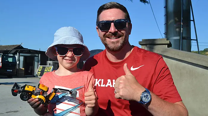 It's a thumbs up from Donal and Lorcan McCarthy, Glandore who were supporting the runners at the Run Skibb half marathon and 10k last  Sunday afternoon. Photo; Anne Minihane.