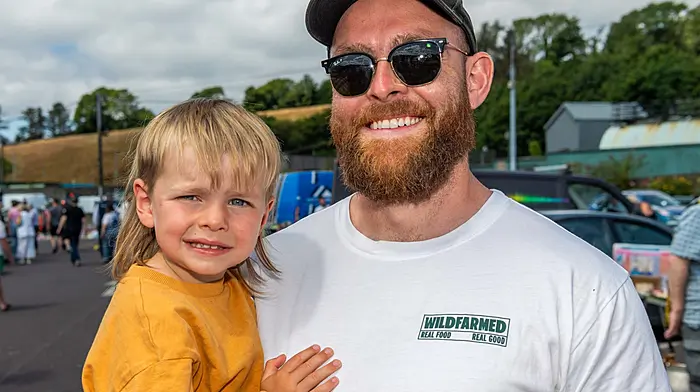Bantry, West Cork, Ireland. 24th Jul, 2026. Bantry Market was thronged with people today making the most of the 22°C weather. Enjoying the hot weather were Sonas & Chris Fahy from Bantry. Picture: Andy Gibson.
