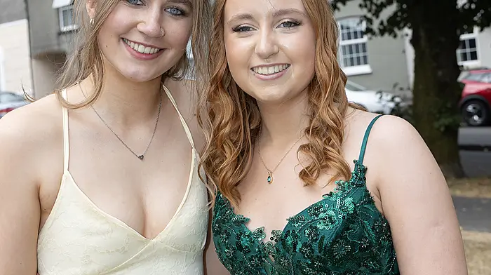 Niamh O'Connell and Laura Dullea on their way to the Dunmanway Debs and making a quick stop at the Shambles in Bandon.  (Photo:  Donie Hurley)