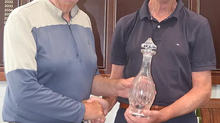 President Dr Colm Quirke presenting his prize to Snowflakes winner Pat O’Regan.
