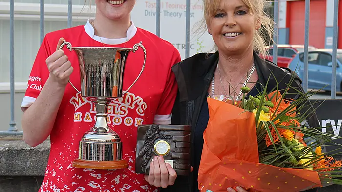 Meabh Cuinnea, Rosscarbery, county U16 winner accepting her prize from Caroline O'Leary, chairperson of the ladies committee of Bol Chumann Na hEireann.