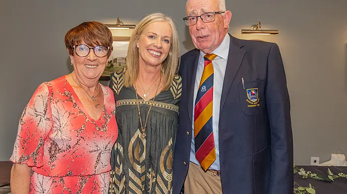 “Bandon Golf,” (L to R) At the awards presentation at Bandon Golf Club, Chris Down, Julie O’Mahony (Winner) and Fred Down, Club President.