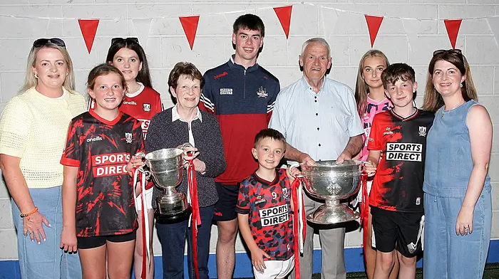Cork minor footballer Rory Twohig with Fiona O'Donovan, Aoibhinn O'Donovan, Clara O'Donovan, Eleanor Keane, Rian Daly, Brendan O'Sullivan, Rachel Daly, Gearóid Daly and Emer Daly. (Photo: Paddy Feen)