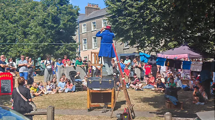 Participants enjoying Mr Gusto's show in the Shambles on the Sunday of the festival.